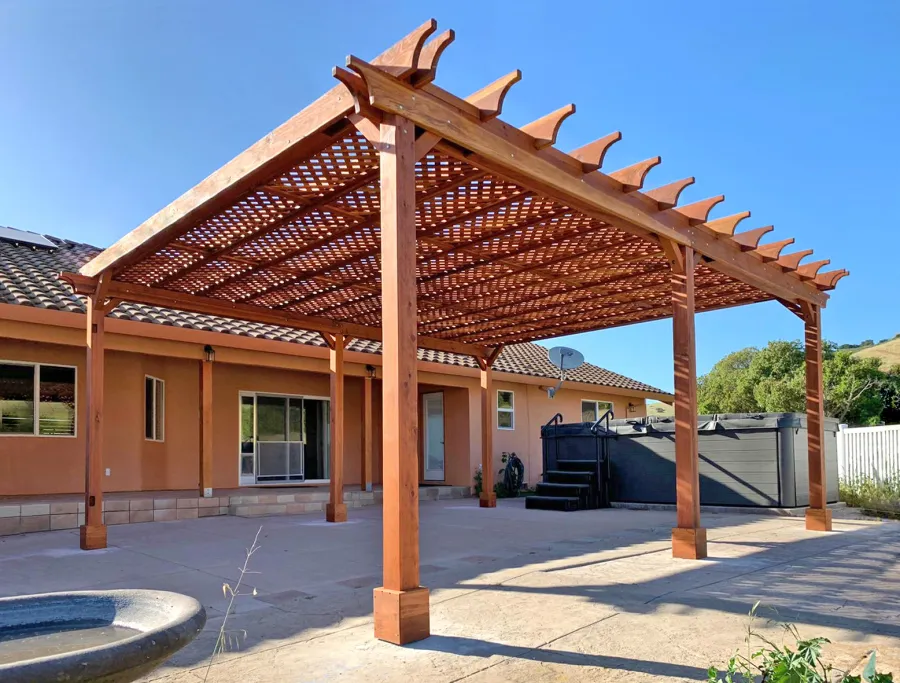 Lattice Pergola Kit (Options: 24' L x 20' W, California Redwood, No Electrical Wiring Trim, Lengthwise Roof Support Timbers, 6-Post Anchor Kit for Concrete, No ceiling Fan Base, No Privacy Panels, No Curtains Rods, 9.5' Post Height, Transparent Premium Sealant). Photo Courtesy of C. Lopez of Salinas, CA.