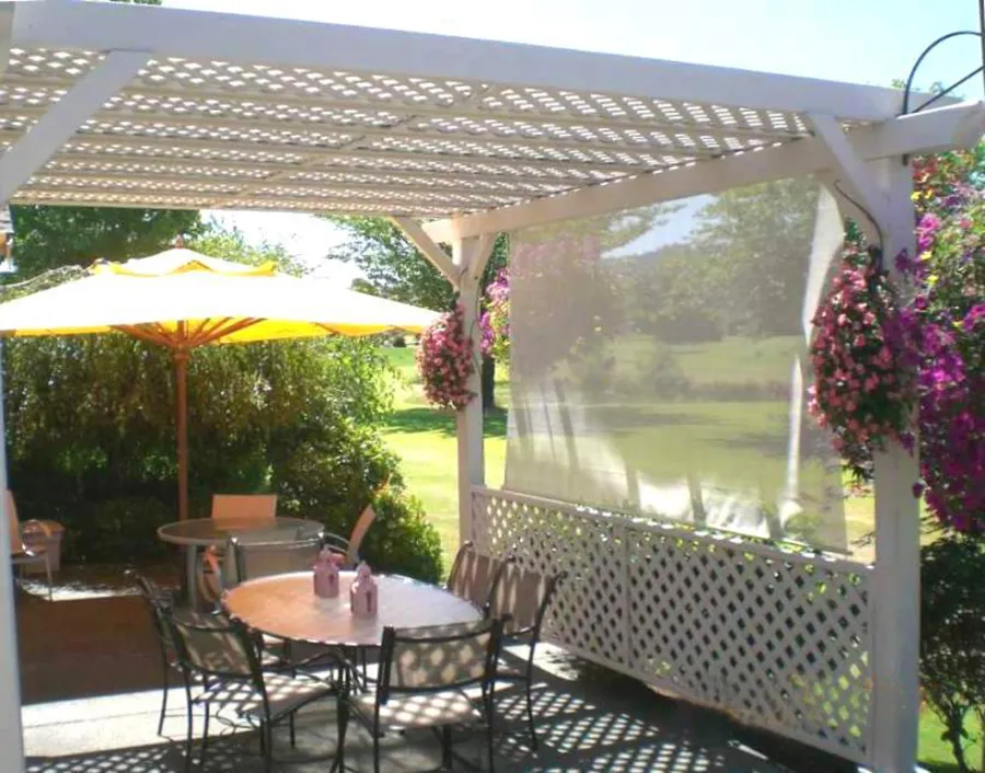 Lattice Pergola Kit (Options:14' x 16', Douglas-fir, No Electrical Wiring Trim, Lengthwise Roof Support, 4-Post Anchor Kit for Concrete, No Ceiling Fan Base, 1 Privacy Panel, No Curtain Rods, 9' Post Height, Off-White Oil-Based Primer). Custom sail clothe made with Sunbrella fabric. Custom request: no roof slats included.