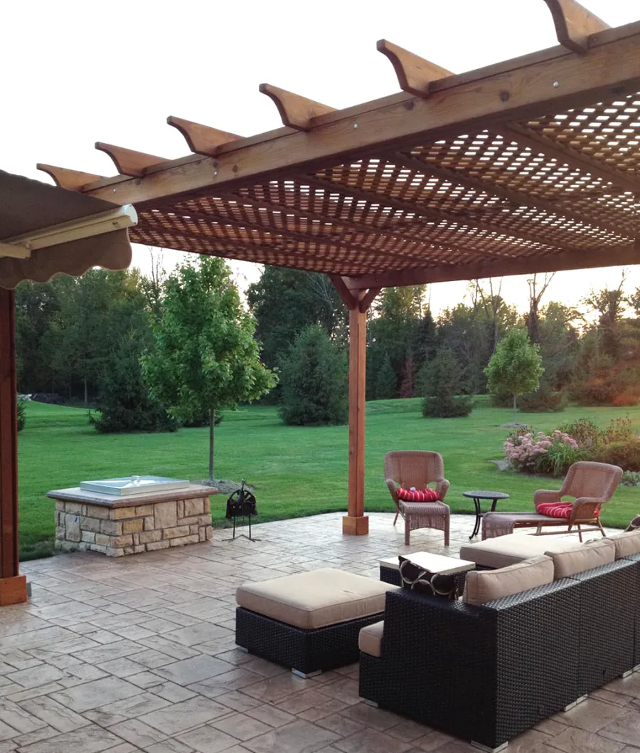Lattice Pergola Kit (Options: 20' L x 16' W, Mature Redwood, No Electrical Wiring Trim, Lengthwise Roof Support Timbers, 4-Post Kit for Stone, Brick, or Concrete, No Ceiling Fan Base, No Privacy Panels, No Curtain Rods, 10' Post Height, Transparent Premium Sealant). Photo Courtesy of David Wilson.