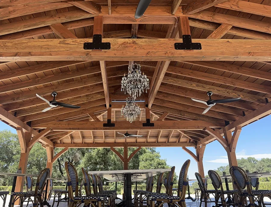 Custom Mia's Pavilion (Options: 35' x 25', Douglas-fir, Post Anchor Kit for High-Wind, 8x8 Posts, 8' H Posts, No Decorative Trims for Posts, with Ceiling Fan Bases, Custom Copper Roof and Gutters, Custom Finish). Photo Courtesy of Jordan Vineyard & Winery, 1474 Alexander Valley Rd, Healdsburg, CA.