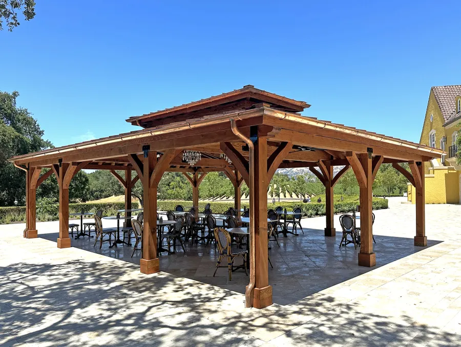 Custom Mia's Pavilion (Options: 35' x 25', Douglas-fir, Post Anchor Kit for High-Wind, 8x8 Posts, 8' H Posts, No Decorative Trims for Posts, with Ceiling Fan Bases, Custom Copper Roof and Gutters, Custom Finish). Photo Courtesy of Jordan Vineyard & Winery, 1474 Alexander Valley Rd, Healdsburg, CA.