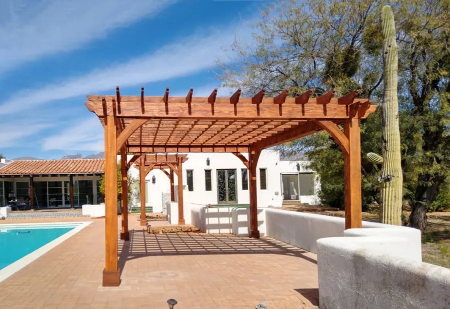 Montvale Pergolas (Options: 14' x 8' & 20' x 16', Douglas-fir, Electrical Wiring Trim for 1 Post, Rafters at 16", 4-Post Anchor Kit for High-Wind, No Ceiling Fan Base, No Privacy Panels, 10' Post, Transparent Premium Sealant). Photo courtesy of M. Simpson of Tucson, Arizona.