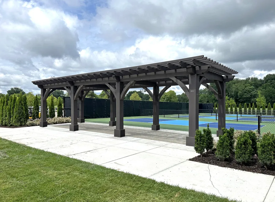 Custom Montvale Pergola (Options: 15' 7 1/2" W x 44' L, California Redwood, 12 x 12 Posts, 9' H, Post Anchor Kit for High-Wind, Custom Stain). Photo Courtesy of C/O Country Club of Detroit, Grosse Pointe Farms, MI.