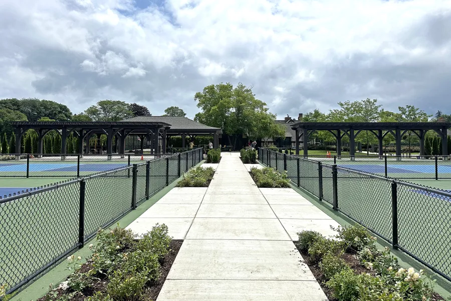 Custom Montvale Pergola (Options: 15' 7 1/2" W x 44' L, California Redwood, 12 x 12 Posts, 9' H, Post Anchor Kit for High-Wind, Custom Stain). Photo Courtesy of C/O Country Club of Detroit, Grosse Pointe Farms, MI.