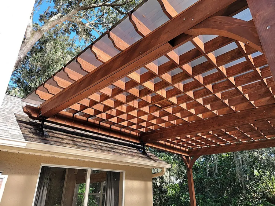 Custom Attached Montvale Pergola (Options: 26' x 18', California Redwood, 12' Posts, with Rain Guard, Coffee-Stain Premium Sealant). Photo Courtesy of D. Fournier of Valrico, FL.