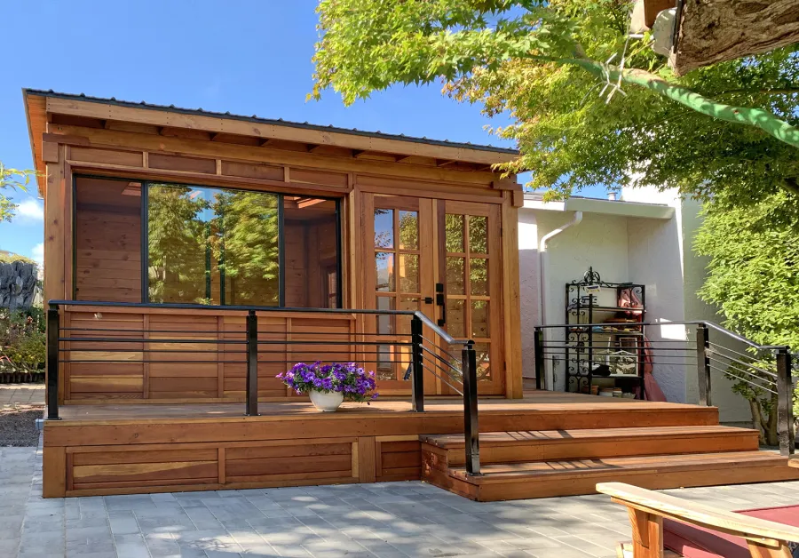 Palo Alto Backyard Cabin (Options: 18' L, 16' W, Without Porch, Structural Deck - Interior and 4' Exterior, California Redwood, Sugar Pine Internal Walls and Ceiling, Windows Purchased Locally, With Two 3' x 5' Skylights, Metal Roof, Custom Railings and Steps, Electrical Wire Trim on the Walls, Transparent Premium Sealant). Photo Courtesy of A. Ramon of South San Francisco, California.