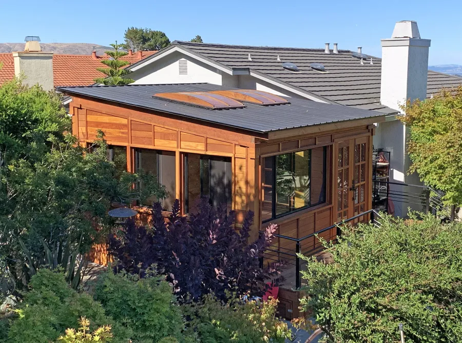 Palo Alto Backyard Cabin (Options: 18' L, 16' W, Without Porch, Structural Deck - Interior and 4' Exterior, California Redwood, Sugar Pine Internal Walls and Ceiling, Windows Purchased Locally, With Two 3' x 5' Skylights, Metal Roof, Custom Railings and Steps, Electrical Wire Trim on the Walls, Transparent Premium Sealant). Photo Courtesy of A. Ramon of South San Francisco, California.