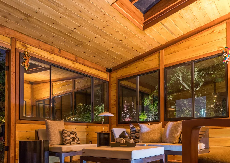 Palo Alto Backyard Cabin (Options: 18' L, 16' W, Without Porch, Structural Deck - Interior and 4' Exterior, California Redwood, Sugar Pine Internal Walls and Ceiling, Windows Purchased Locally, With Two 3' x 5' Skylights, Metal Roof, Custom Railings and Steps, Electrical Wire Trim on the Walls, Transparent Premium Sealant). Photo Courtesy of A. Ramon of South San Francisco, California.