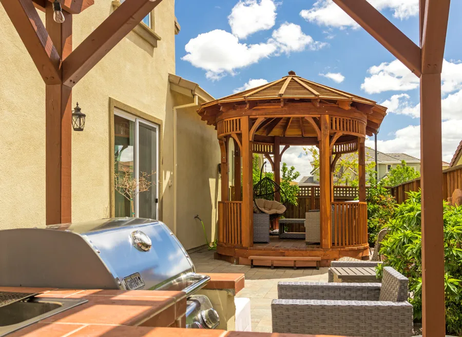 Palomar Round Pavilion (Options: 15' L x 10'-6" W, with Deck, California Redwood, With Upper Corvels and Lower Panels, Transparent Premium Sealant). Photo Courtesy of A. Singh of Dublin, California.