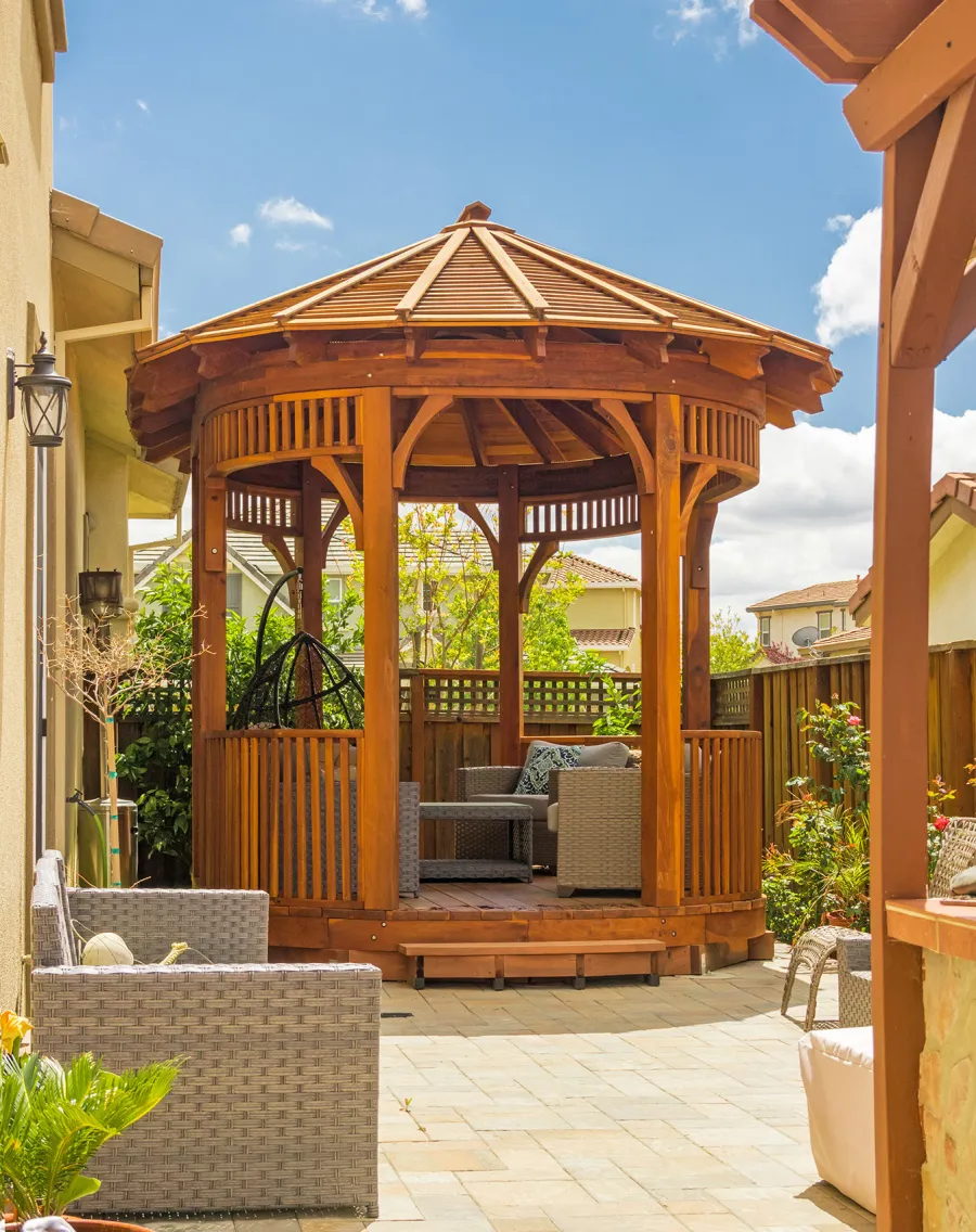 Palomar Round Pavilion (Options: 15' L x 10'-6" W, with Deck, California Redwood, With Upper Corvels and Lower Panels, Transparent Premium Sealant). Photo Courtesy of A. Singh of Dublin, California.