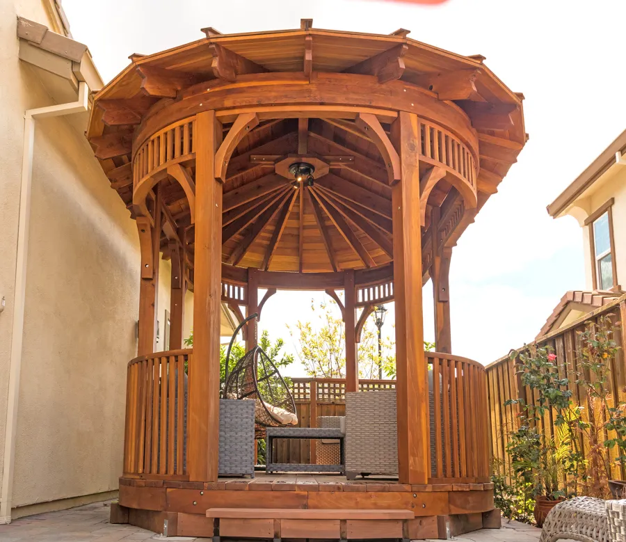 Palomar Round Pavilion (Options: 15' L x 10'-6" W, with Deck, California Redwood, With Upper Corvels and Lower Panels, Transparent Premium Sealant). Photo Courtesy of A. Singh of Dublin, California.
