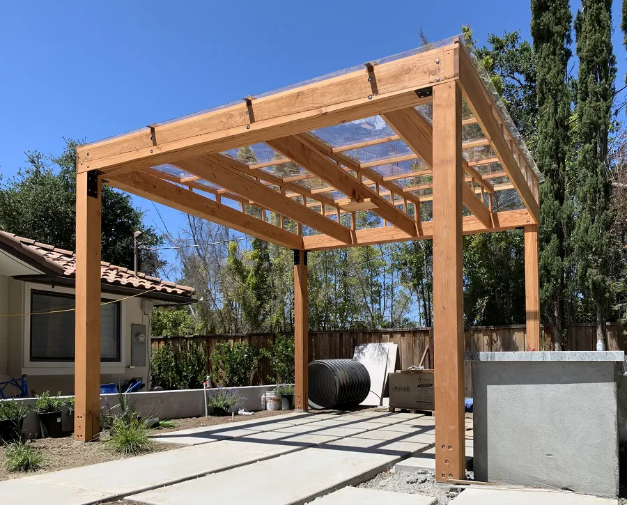 Sun Pergola (Options: 10' L x 10' W, With Rainguard, No Privacy Panel, Douglas Fir, No Curtain Rods, 1 Ceiling Fan Base, 10.5 ft Posts Height, Electrical Wiring Trim Kit for 4 Posts, Post Anchor Kit for High-Wind, Transparent Premium Sealant).
