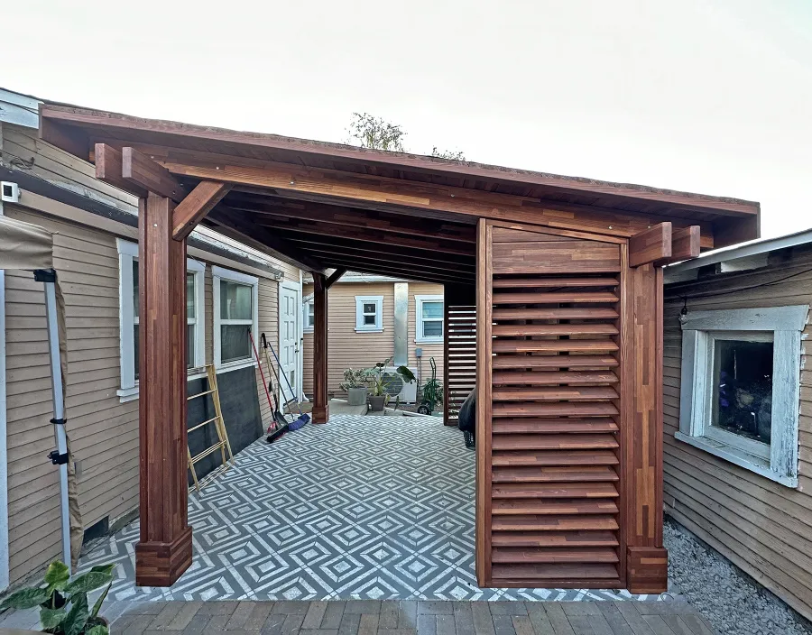Sunset Patio Pavilion (Options: 14' x 12', Wall Privacy Panel Combination and Fixed Louvered Panels, Mosaic Redwood, 8ft H, Electrical Wiring Trim for 1 Post, 4-Post Anchor Kit for Concrete, Vertical Post Decorative Trims, No Ceiling Fan Base, Coffee-Stain Premium Sealant). Photo Courtesy of J. Ringer of Glendale, CA.