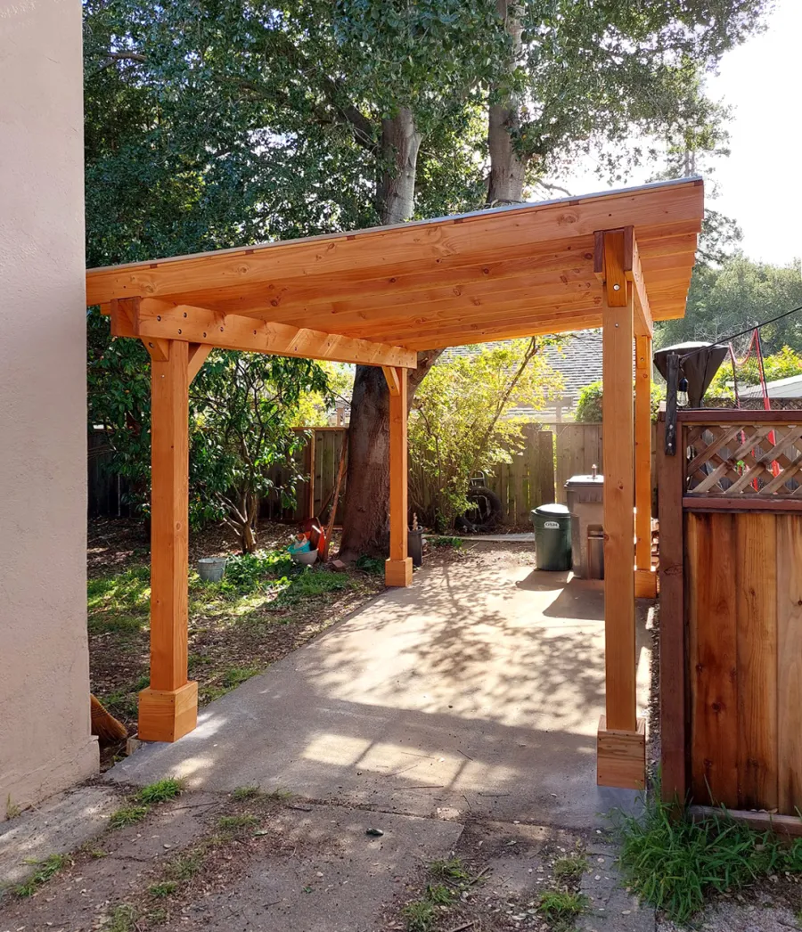 Custom Sunset Patio Pavilion (Options: 15' L x 10'-6" W, No Privacy Panels, Douglas-fir, No Electrical Wiring Trim, 4-Post Anchor Kit for Concrete, No Post Decorative Trim, with Transparent Polycarbonate Roofing Panels Instead of the Standard Roof Boards, No Ceiling Fan Base, No Curtain Rods, Transparent Premium Sealant). Photo Courtesy of L. Draper of Aptos, California.