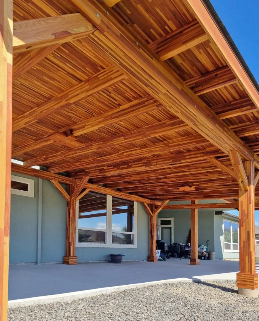 Sunset Patio Pavilion (Options: 28' x 17', Mosaic Redwood, Custom Post Height, 1 Electrical Wiring Trim, 6-Post Anchor Kit for High-Wind, No Post Decorative Trim, 2 Ceiling Fan Bases, No Curtain Rods, Transparent Premium Sealant). Photo Courtesy of M. Neideffer of Star, ID.