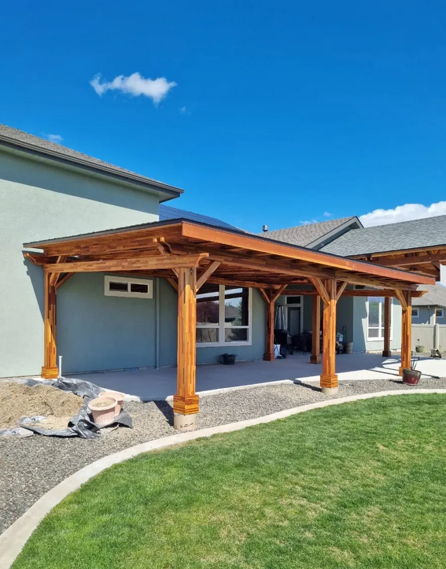 Sunset Patio Pavilion (Options: 28' x 17', Mosaic Redwood, Custom Post Height, 1 Electrical Wiring Trim, 6-Post Anchor Kit for High-Wind, No Post Decorative Trim, 2 Ceiling Fan Bases, No Curtain Rods, Transparent Premium Sealant). Photo Courtesy of M. Neideffer of Star, ID.
