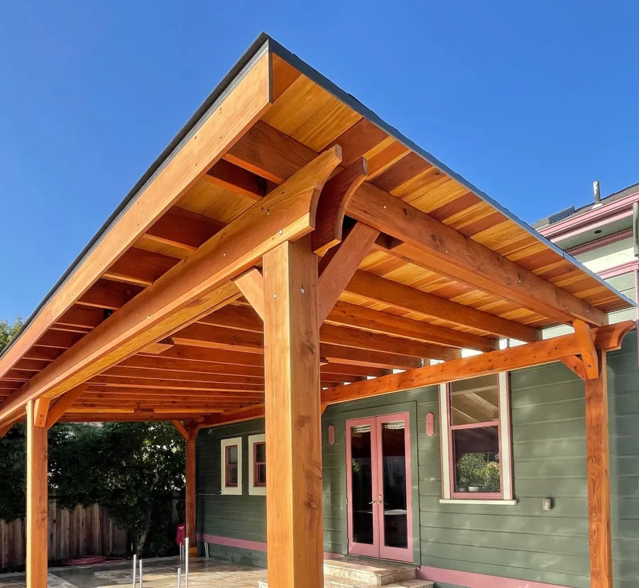 Sunset Patio Pavilion (Options: 35' x 18', California Redwood, 9ft H, 3 Electrical Wiring Trims, 6-Post Anchor Kit for High-Wind, No Post Decorative Trim, 4 Ceiling Fan Bases, No Curtain Rods, Transparent Premium Sealant). Photo Courtesy of L. Shelton of San Jose, California.