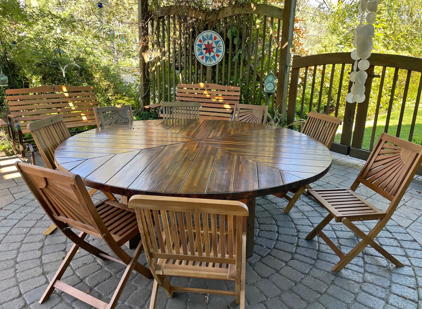 Photo Shows a Sunset Patio Table 8 Years After Installation, Table Was Just Refinished From a Fire, Mosaic Redwood, in Vida, Oregon