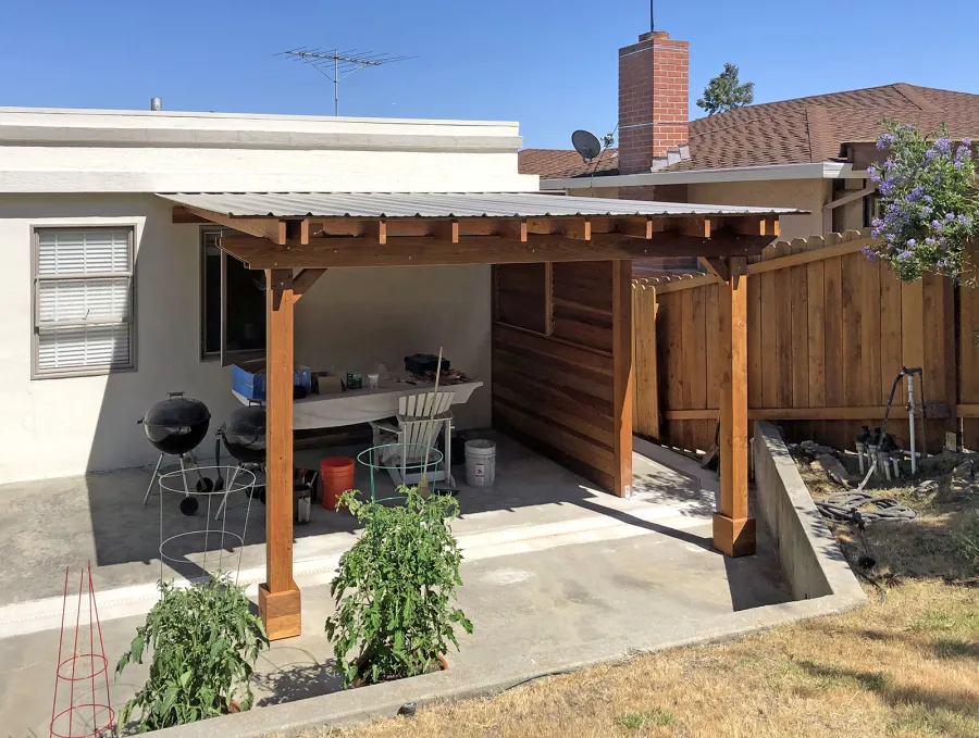 Sunset Porch Pavilion (Options: 14' x 14', California Redwood, Attached to Wall Per Custom Request, 8ft H, No Electrical Wiring Trim, 2-Post Anchor Kit for High-Wind, No Post Decorative Trim, No Ceiling Fan Base, No Curtain Rods, Transparent Premium Sealant). Photo Courtesy of G. Tommasi of San Carlos, California. - Added a Privacy Panel - Solid Wall at Bottom and Mobile Louvers Upper Panel per CUSTOMER REQUEST