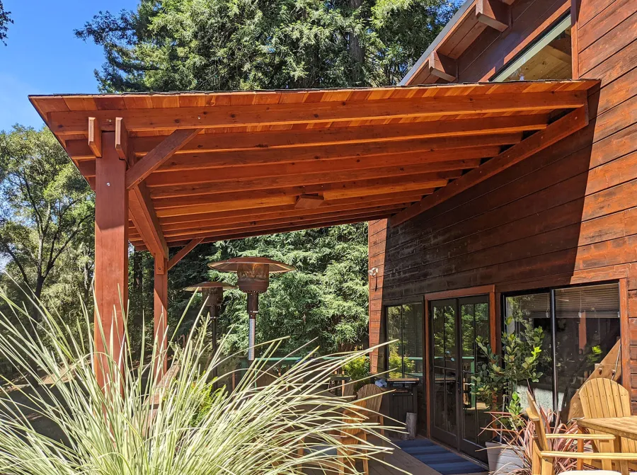 Sunset Porch Pavilion (Options: 18' L x 15' W, California Redwood, Attached to House, 22ft H Posts [From Ground to Tall Deck] by Custom Request, No Electrical Wiring Trim, 2-Post Anchor Kit for Concrete, No Post Decorative Trim, No Ceiling Fan Base, No Curtain Rods, Transparent Premium Sealant). Photo Courtesy of L. Draper of Aptos, California.