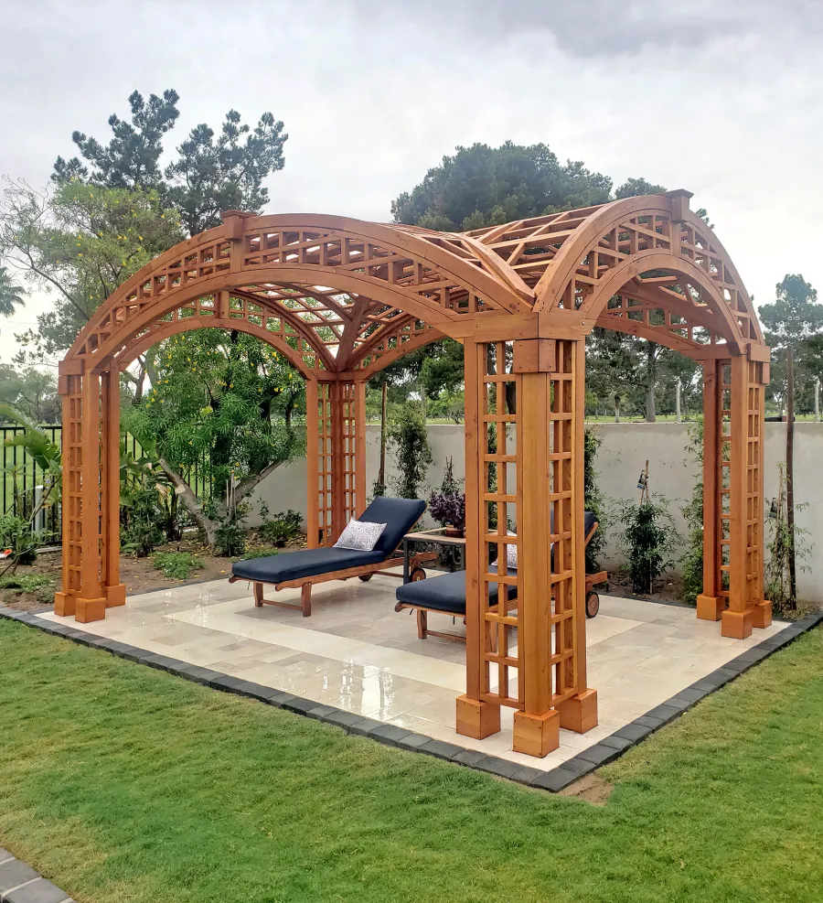 Victorian Arch Trellis Pergola (Options: 16' L x 10' W, Douglas-fir, Post Anchor Kit for Concrete, No Rain Guard, Transparent Premium Sealant). Photo Courtesy of B. Rowlison of Martinez Lake, AZ.