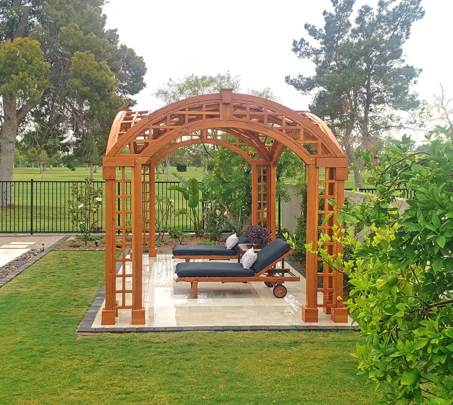 Victorian Arch Trellis Pergola (Options: 16' L x 10' W, Douglas-fir, Post Anchor Kit for Concrete, No Rain Guard, Transparent Premium Sealant). Photo Courtesy of B. Rowlison of Martinez Lake, AZ.