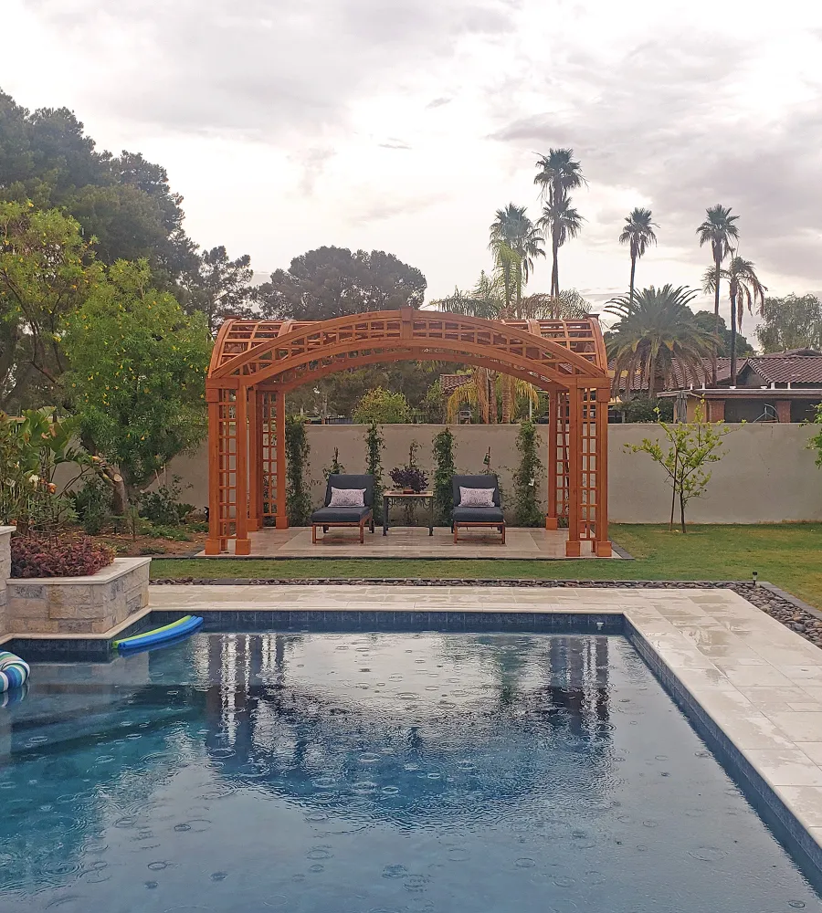 Victorian Arch Trellis Pergola (Options: 16' L x 10' W, Douglas-fir, Post Anchor Kit for Concrete, No Rain Guard, Transparent Premium Sealant). Photo Courtesy of B. Rowlison of Martinez Lake, AZ.