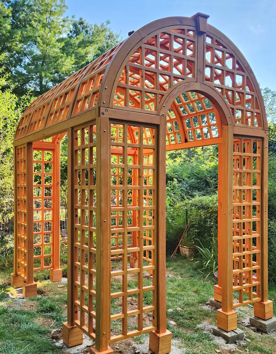 The Victorian Trellis (Options: 10' L x 8' W, Without Arcs and Lattice Panels, Douglas-fir, No Rain Guard, No Electrical Wiring Trim, Post Anchor Kit for High-Wind, 4x4 Posts, No Ceiling Fan Base, Transparent Premium Sealant). Photo Courtesy of C. Freeman of Saylorsburg, PA.