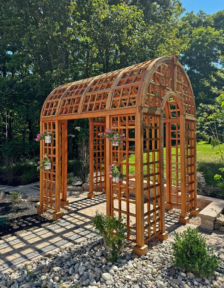 The Victorian Trellis (Options: 10' L x 8' W, Without Arcs and Lattice Panels, Douglas-fir, No Rain Guard, No Electrical Wiring Trim, Post Anchor Kit for High-Wind, 4x4 Posts, No Ceiling Fan Base, Transparent Premium Sealant). Photo Courtesy of C. Freeman of Saylorsburg, PA.