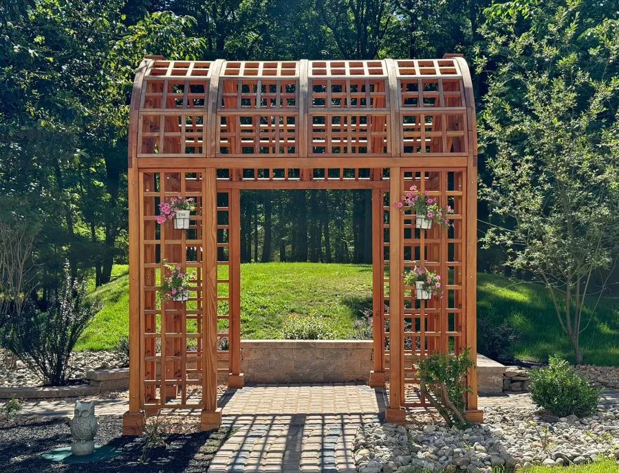 The Victorian Trellis (Options: 10' L x 8' W, Without Arcs and Lattice Panels, Douglas-fir, No Rain Guard, No Electrical Wiring Trim, Post Anchor Kit for High-Wind, 4x4 Posts, No Ceiling Fan Base, Transparent Premium Sealant). Photo Courtesy of C. Freeman of Saylorsburg, PA.