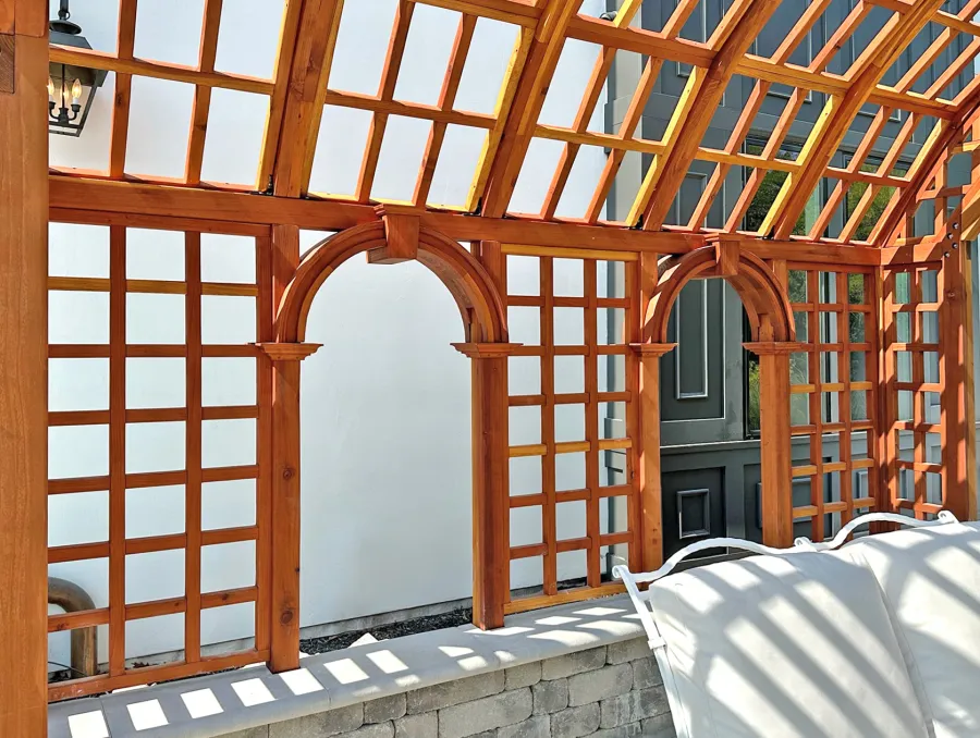 The Victorian Trellis (Options: 13' L x 16'-6" W, Combination of Arcs and Lattice Panels, California Redwood, No Rain Guard, 8' Post Height, No Electrical Wiring Trim, No Ceiling Fan Base, Transparent Premium Sealant). Photo Courtesy of J. Christesen of Kansas City, Missouri.