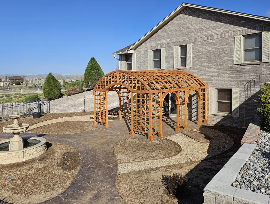 The Victorian Trellis (Options: 16' L x 16' W, Combination of Arcs and Lattice Panels, Douglas-Fir, No Rain Guard, 7' Post Height, 3 Electrical Wiring Trims, Ceiling Fan Base with Rain Guard, Transparent Premium Sealant). Photo Courtesy of R. Lamb of Commerce City.