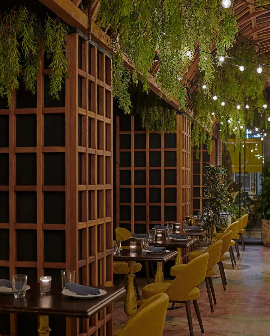 Custom Victorian Trellis (Options: California Redwood, Transparent Premium Sealant). Installed at restaurant ALLAVITA in 564 W Randolph St, Chicago, IL. Design By Kehoe Designs, Photographer: Anthony Tahlier.