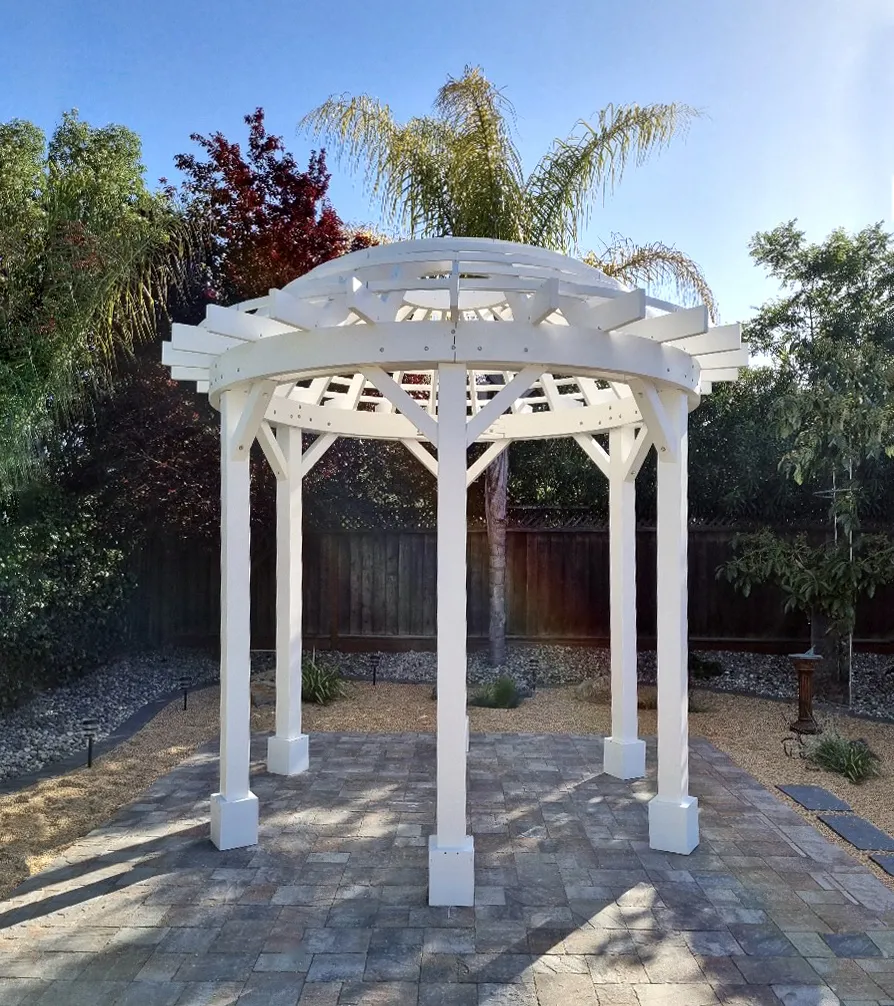 Wooden Dome Pergola (Options: 12' Diameter, No Deck, Douglas-fir, Open Roof with Slats at 6", 9' Posts, No Electrical Wiring Trim, 6-Post Anchor Kit for Concrete, Off-White Oil-Based Primer). Photo Courtesy of J. McPeak of San Jose, CA.