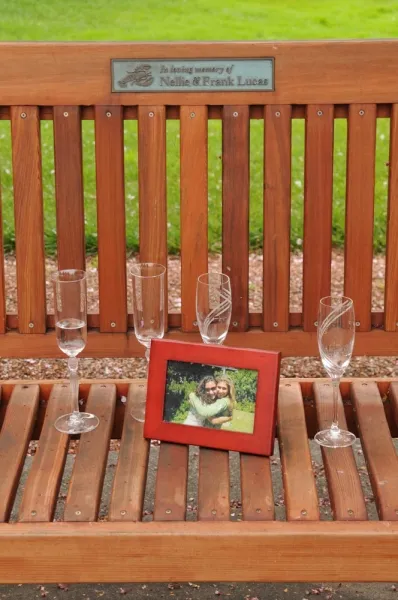 Ti Amo Benches (Options: 5 ft, Old-Growth Redwood, No Cushion, No Engraving, Custom Plaque Provided by Customer, Transparent Premium Sealant). Photo Courtesy of Ms. Linda L. of Napa, CA.  