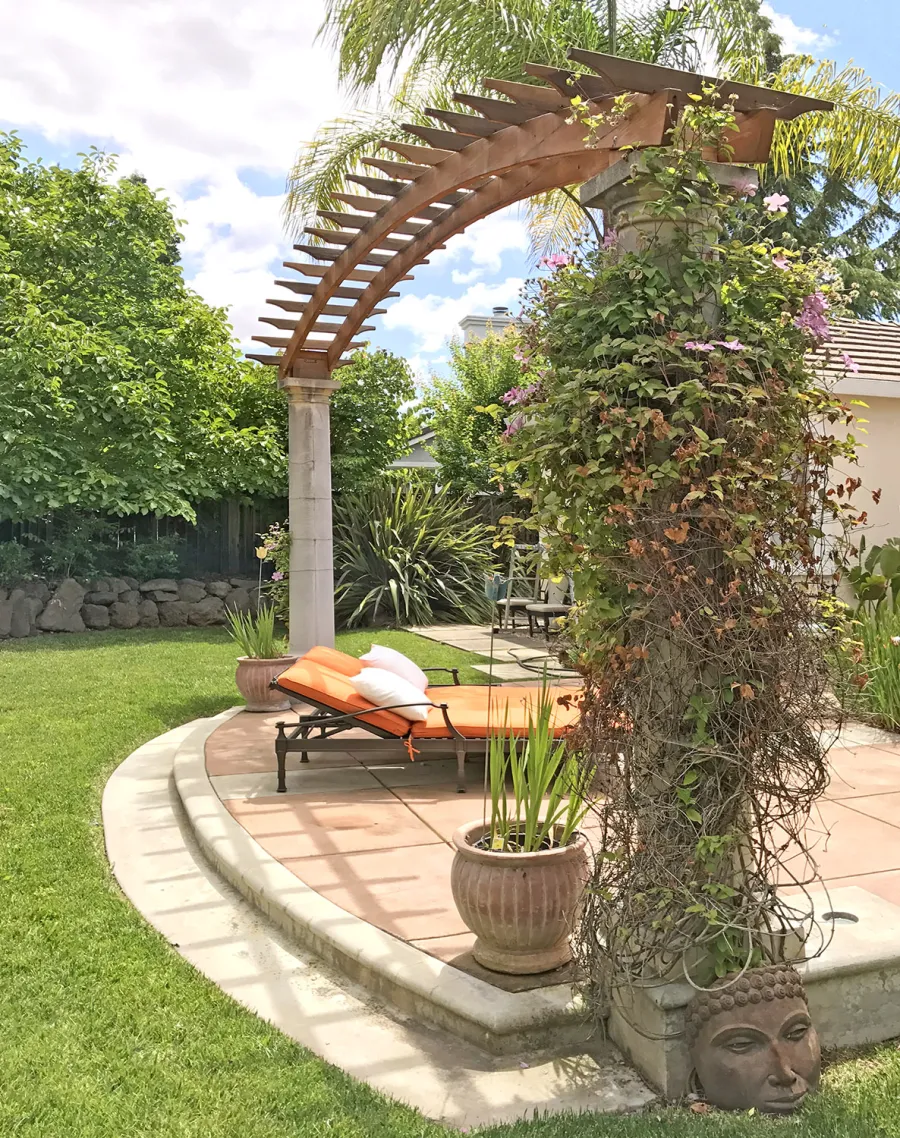 Custom Two-Post Arched Wood Arbor (Options: 22'-10" x 3', California Redwood, No Posts, Attached to Load Bearing Columns, No Privacy Panels, Transparent Premium Sealant). Photo Courtesy of Uli Rankers of Livermore, California.