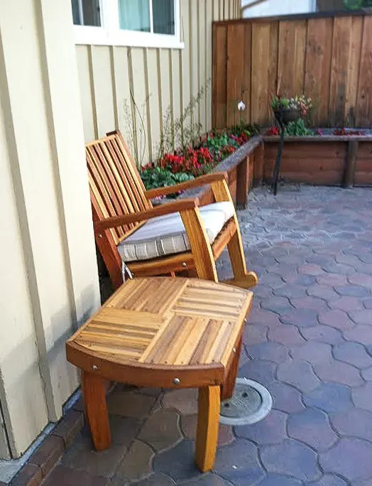 Vera's Custom Wood Side Table (Options: 21 ½", Redwood, 18" H, Transparent Premium Sealant) with a Ruth Rocking Chair. Photo Courtesy of Julie Joyce of Cupertino, CA.