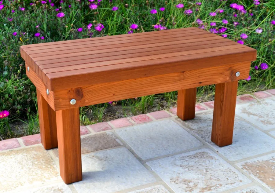 Wood Patio Bench (Options: 2 1/2 ft x 16 inches W x 15 1/2 inches H,Mature Redwood, No Cushion, No Engraving, Transparent Premium Sealant). Photo Courtesy of The Estero Beach Resort, Ensenada, Mexico.