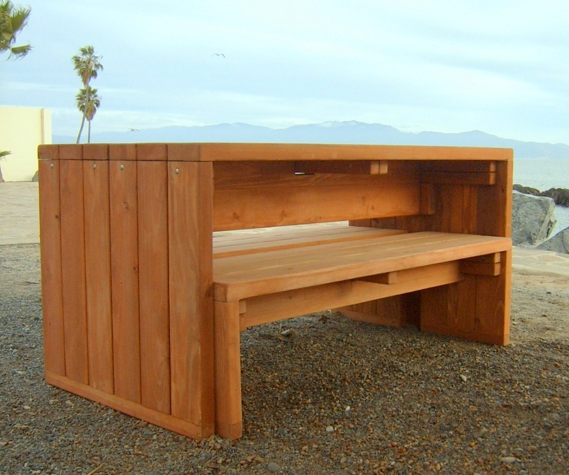 SIDE VIEW OF TABLE WITH BENCHES UNDERNEATH: Maynard Modern Redwood Patio Table (Options: 6' L, 34 1/2" W Tabletop, Side Benches, Douglas-fir, 1 Full Length Side Bench/Side, Standard Tabletop, No Umbrella Hole, Transparent Premium Sealant). 
