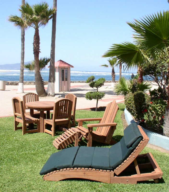 Curved Wooden Sun Lounger With a Smooth Wood Finish