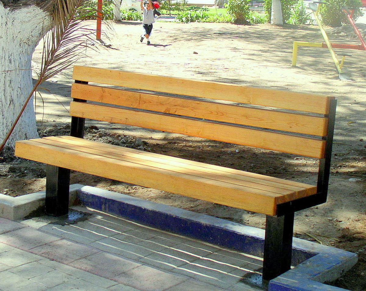 Veterans Wood Bench (Options: 6 ft, Douglas-fir, Extra Long Legs, No Cushion, No Engraving, Transparent Premium Sealant). Photo was taken just after installation - note wet concrete around bench legs.