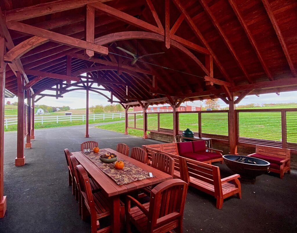 Cardinal's Nest Pavilion with
San Francisco Redwood Patio Table (left) and Kari's Modern Wood Chair custom sectional (right).
Photo courtesy of S. Steckman of East Liverpool, OH.
