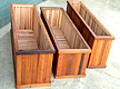 Planters without interior sealant